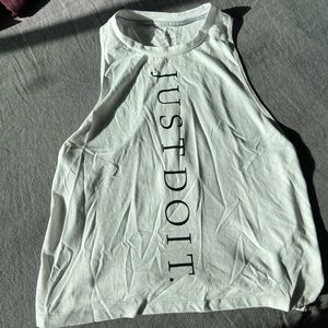 White Nike “Just Do It’ll sleeveless dri-fit top